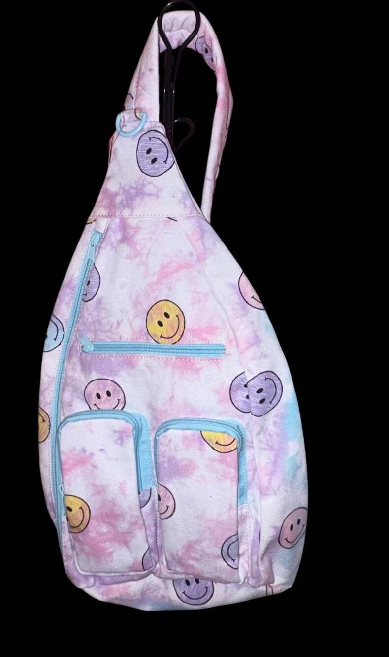 No Boundaries Tie-Dye Smiley Face Cargo Sling Backpack
